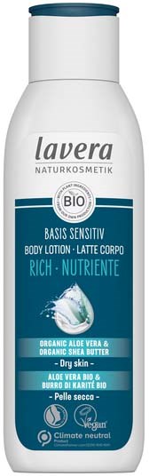 Lavera body lotion bottle, white and blue, with text about organic ingredients and skin sensitivity.