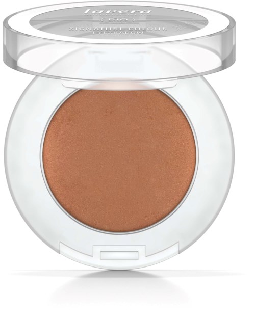 En rund makeup-rougekompakt med genomskinligt lock och ljusbrunt pulver inuti.