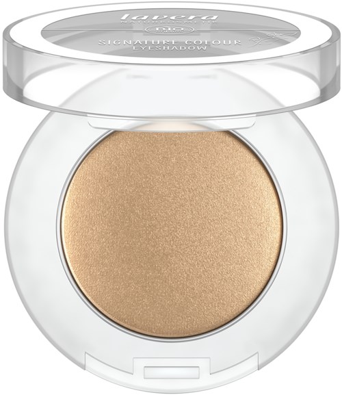A small round makeup container with a clear lid, showing a beige, shimmery eyeshadow inside.