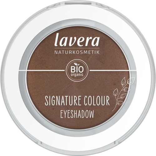 A round eyeshadow container labeled 'Lavera' with brown color and decorative leaves on the right side.