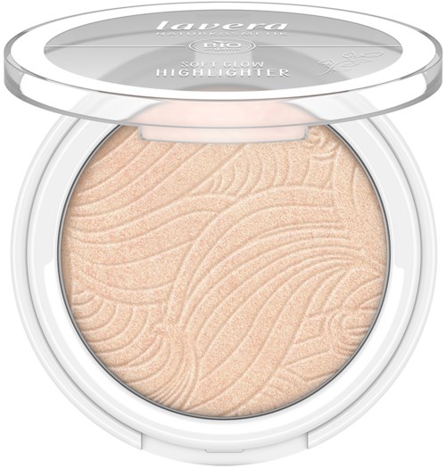 Ein runder Kompakt-Cream-Highlighter mit strukturierter Oberfläche und transparentem Deckel mit Laura Geller-Logo.