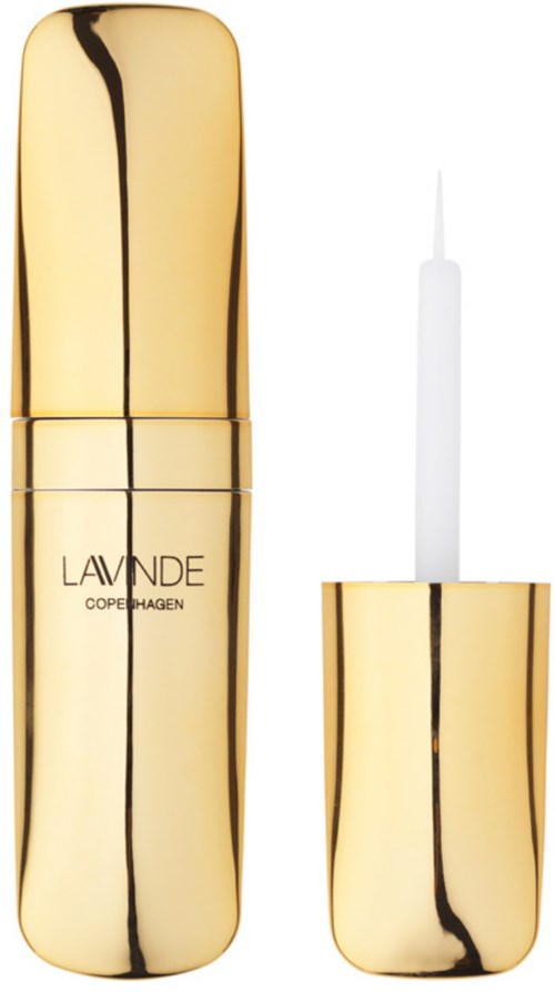 Ein goldener Lippenstift mit schwarzem Linienmuster und weißem Applikator.