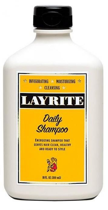 Shampoo bottle with yellow label, black cap, and bold black and white text for Layrite Daily Shampoo.