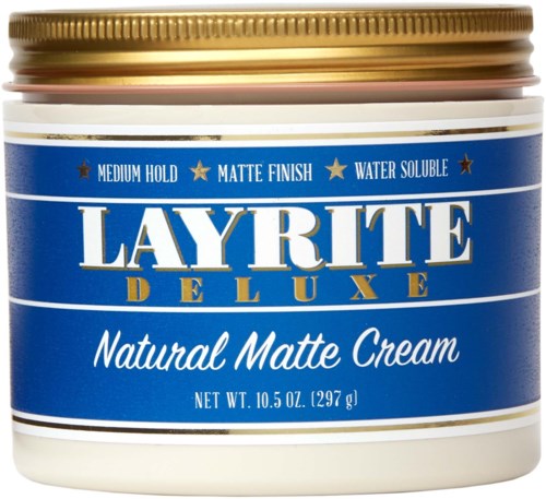 A round blue container with a gold lid, labeled Layrite Deluxe Natural Matte Cream, 10.5 ounces.