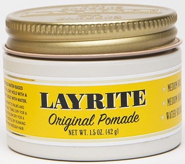 A small jar of Layrite Original Pomade with a yellow label and a gold lid.