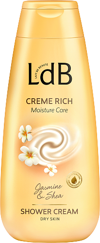 Eine goldene Flasche mit Duschcreme mit Jasmin und Shea, für trockene Haut, beschriftet 'LdB Creme Rich' und 'Moisture Care.'