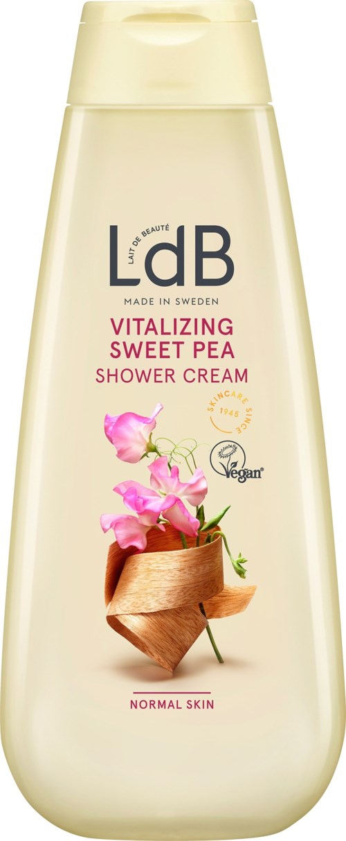Duschcremeflasche mit rosa Blumen, braunem Band und Vegan-Symbol.