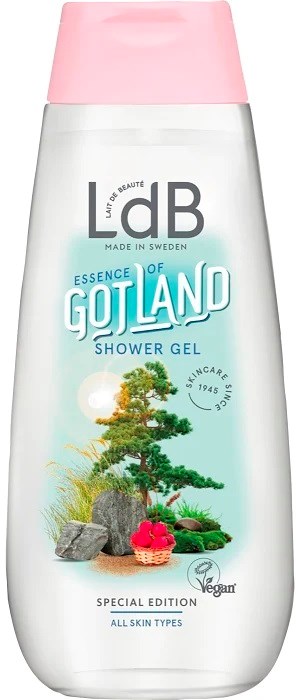 Eine weiße Duschgel-Flasche mit rosa Kappe, zeigt eine Landschaft mit Baum, Steinen und roten Beeren, mit der Aufschrift "Gotland."