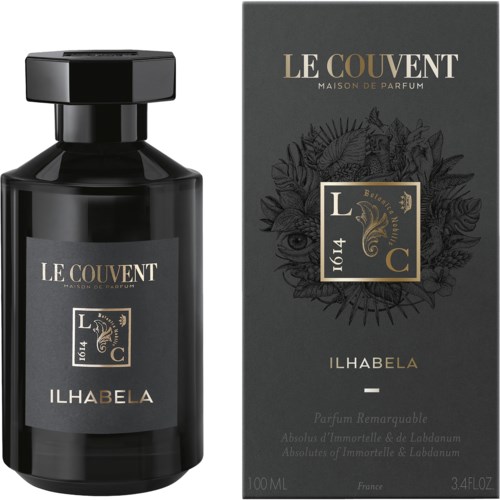 Een zwarte parfumfles en doos met 'ILHABELA' van Le Couvent, met goud- en witte tekst en bloemenontwerp.
