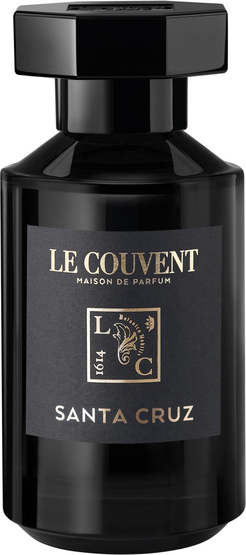 Een zwarte parfumfles met een grijs etiket met de tekst 'Le Couvent Maison de Parfum Santa Cruz.'