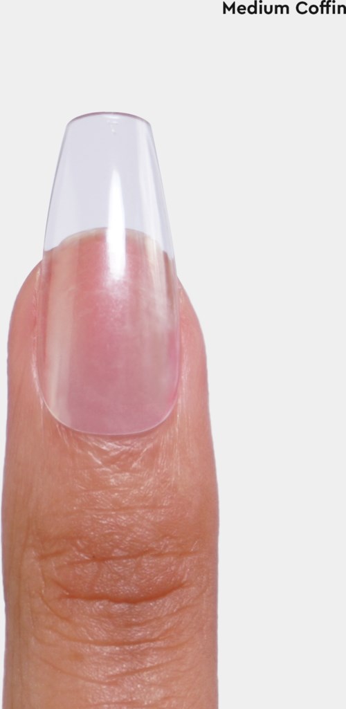 A person's finger with a clear or light pink nail polish, showing well-manicured nails and skin details.