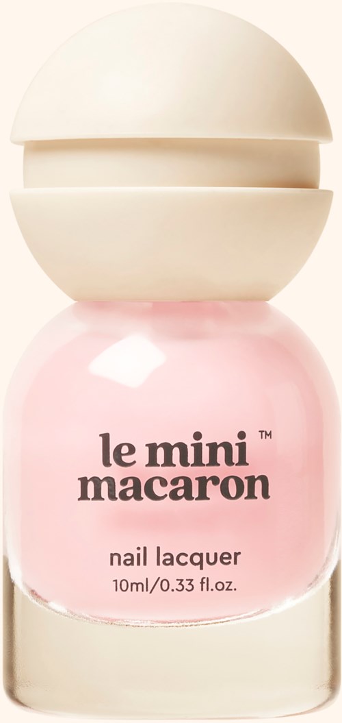 Pink nail polish bottle with a white cap, labeled "le mini macaroon nail lacquer."