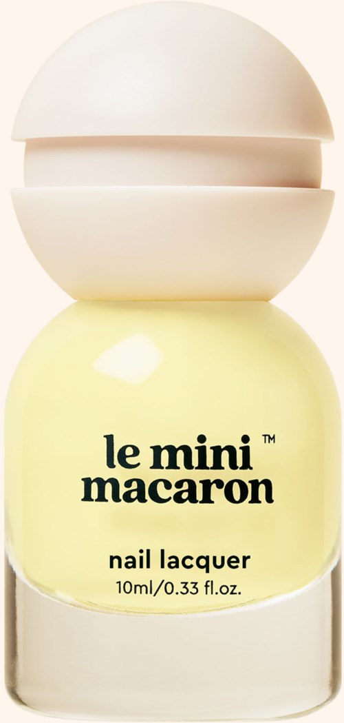 A small bottle of yellow nail lacquer named 'le mini macaron'. It has a round white cap.