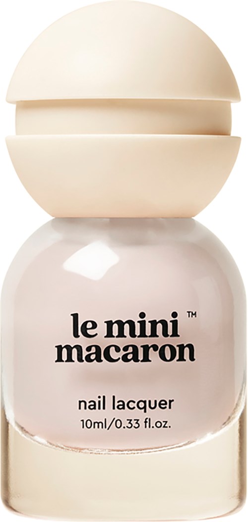 A small white bottle of nail lacquer labeled 'le mini macaron' with a rounded cap.