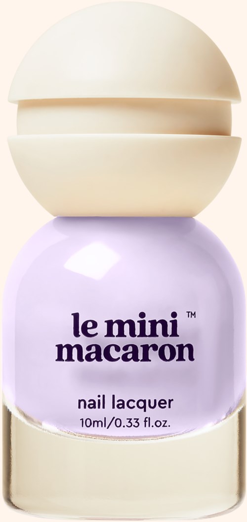 A small purple nail polish bottle with a round beige cap and the text 'le mini macaroni' on it.