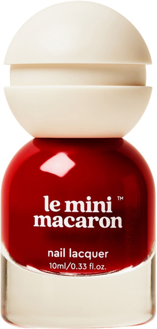 Red nail polish bottle with a white cap, labeled 'le mini macaron' and 'nail lacquer'.