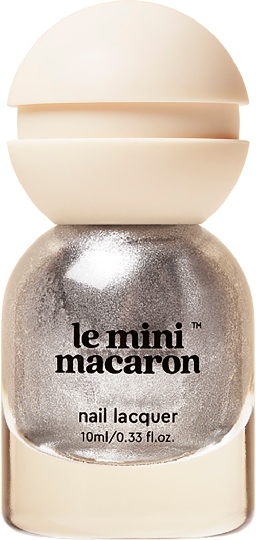 A small bottle of gray nail lacquer labeled "le mini macaron" with a rounded cap.