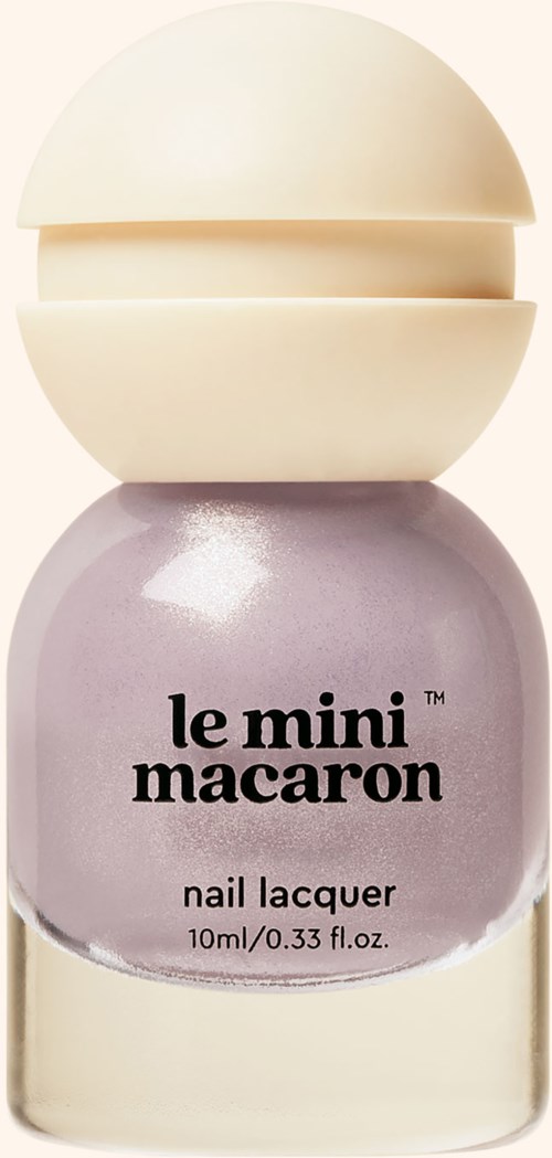 A small lavender nail polish bottle with a cream-colored cap, labeled 'le mini macaron' and 'nail lacquer'.