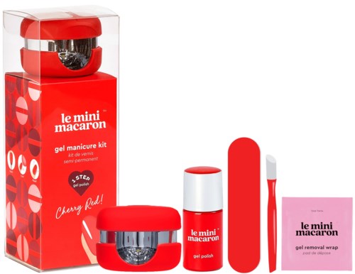 A red and white mini gel manicure kit with nail polish, remover wipe, toothbrush, and storage box.