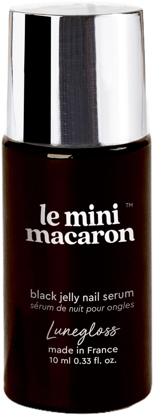 A small black bottle with a silver cap, labeled 'le mini macaron' and 'black jelly nail serum' in white text.