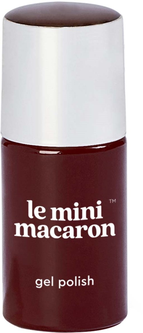 En liten flaska med röd gelnagellack med vit kork, märkt 'le mini macaron'.