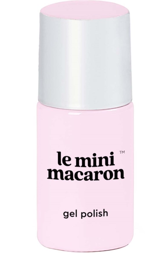 A small pink bottle with a white cap, labeled 'le mini macaron gel polish' for nails.