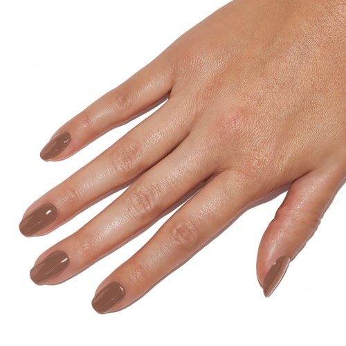 A hand with neatly painted brown fingernails. The skin looks smooth and well cared for.