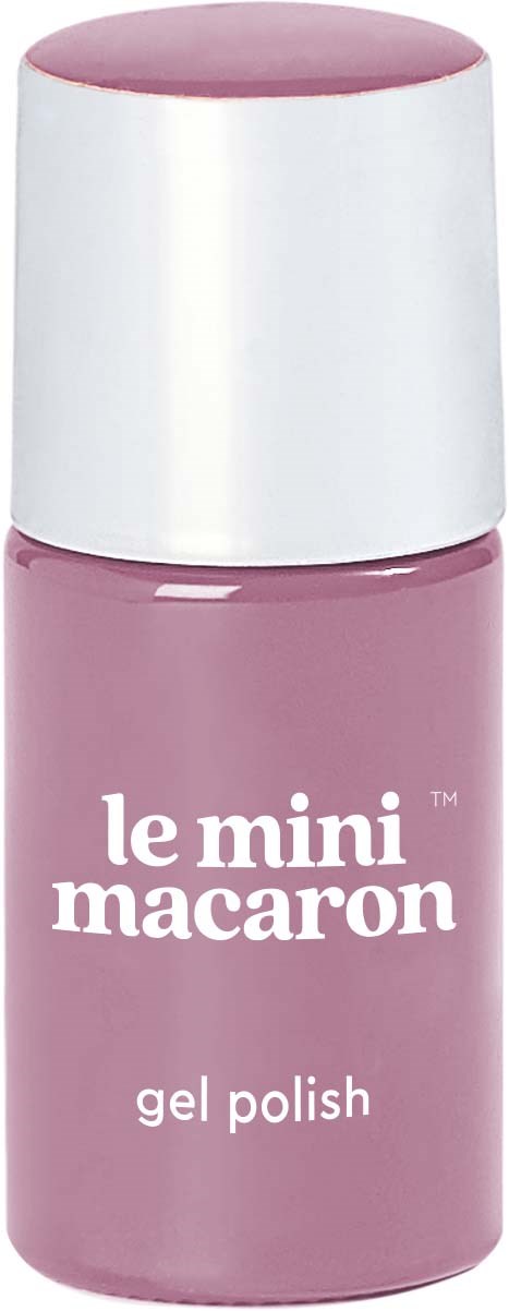 A small pink bottle with a white cap labeled 'le mini macaron gel polish'.