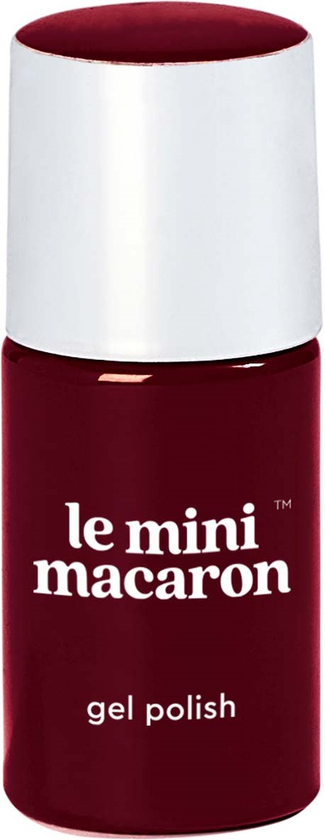 A small bottle of deep red gel nail polish labeled 'le mini macaron' with a white cap.