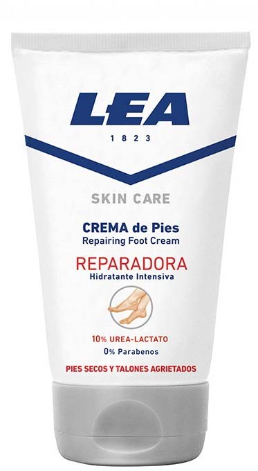 A white tube of foot cream with blue and red text, indicating it's for repairing and moisturizing dry, cracked heels.