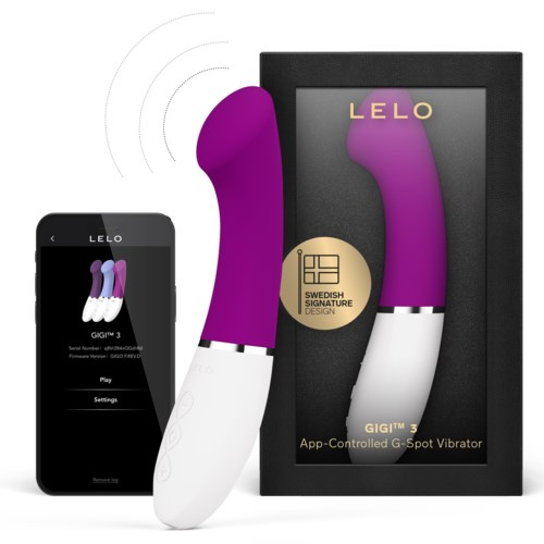 Lila und weiße, app-gesteuerte Vibrator in einer Schachtel mit einem Smartphone, das seine Steuerung zeigt.
