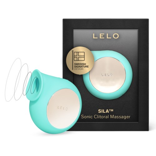 A teal, egg-shaped device called SILA, designed for clitoral massage, next to its black box packaging.