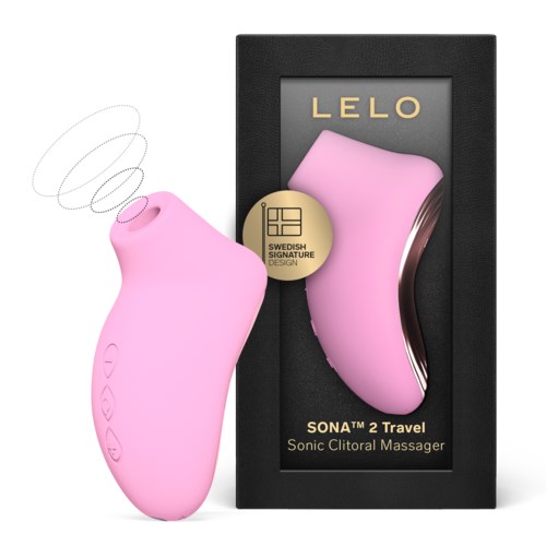 A pink, egg-shaped device for intimate massage, shown next to its black box packaging with brand name LELO.