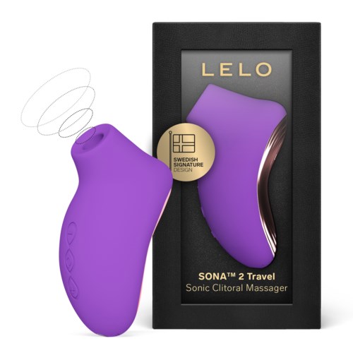 Lila Gerät mit welliger Silberlinie, neben seiner schwarzen Verpackung mit Sichtfenster.