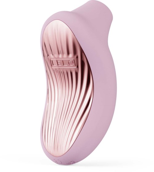 An elegant pink and silver curved beauty device with a textured surface and 'ILEQ' label.