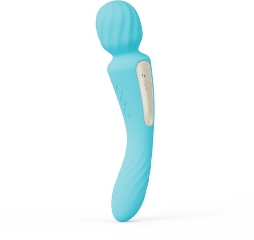 A light blue facial cleansing device with a textured, rounded top and a slim, curved body.