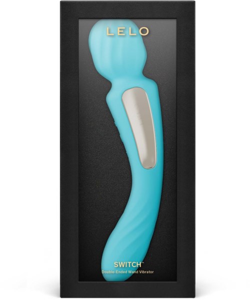 A teal-colored vibrator with a curved shape, silver controls, in a black box. Brand name LELO, model SWITCH.