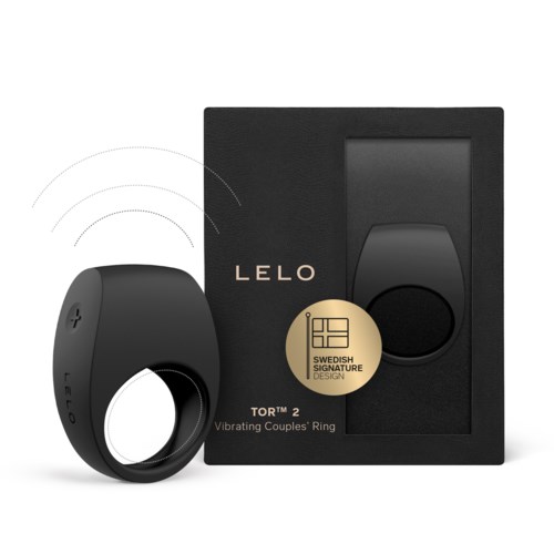 Ein schwarzer Vibrationsring neben einer schwarzen Verpackung mit 'LELO' und 'TOR™ 2'.