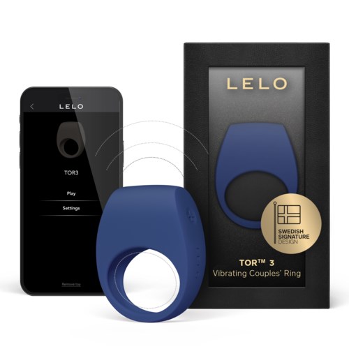Ein blauer tragbarer Ring ist neben einem Smartphone und einer Verpackung mit Marke, für persönliche Freude, zu sehen.