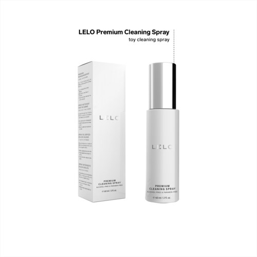 Eine weiße Sprühflasche mit Silberkappe neben einer Box, beschriftet 'LELO Premium Cleaning Spray'.