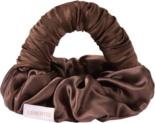 A hair scrunchie made of shiny brown satin fabric with a white label reading 'LENOiTES'.
