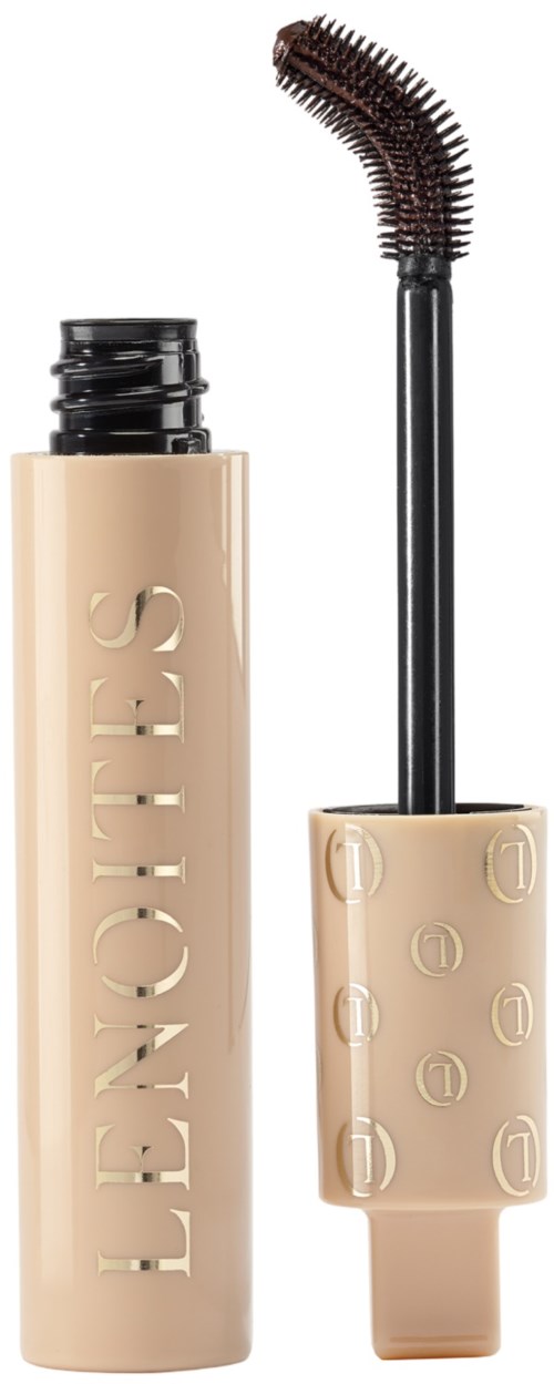 Beige tub av Lionesse mascara med en böjd applikatorborste.