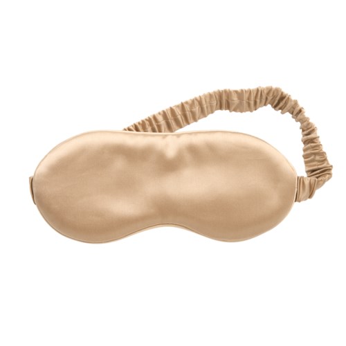 Eine beigen Schlafmaske mit elastischem Band, die die Augen vollständig bedeckt.