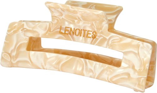 A beige plastic hair clip with the word "LENOITES" on it, designed to hold hair back.