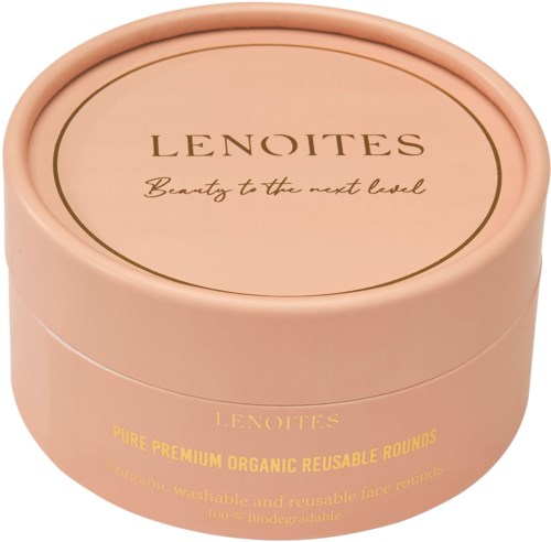 A round, peach-colored container with gold and black text, holding organic reusable face rounds, biodegradable and washable.