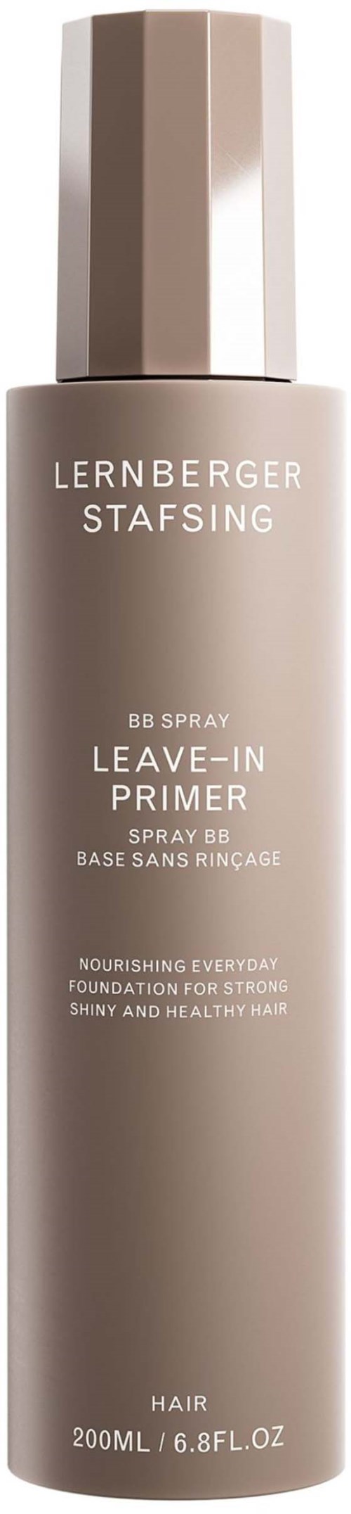 Eine lange, beigen Flasche mit glänzendem Deckel, beschriftet mit "LERNBERGER STAFSING" und "Leave-In Primer" für Haare.