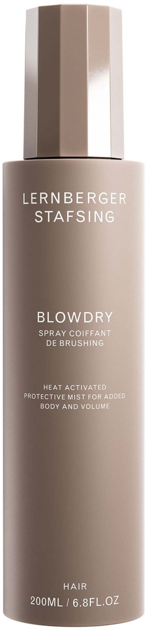 Eine Haarsprayflasche namens Blowdry mit silberner und beiger Kappe, um Volumen zu verleihen und Haare zu schützen.