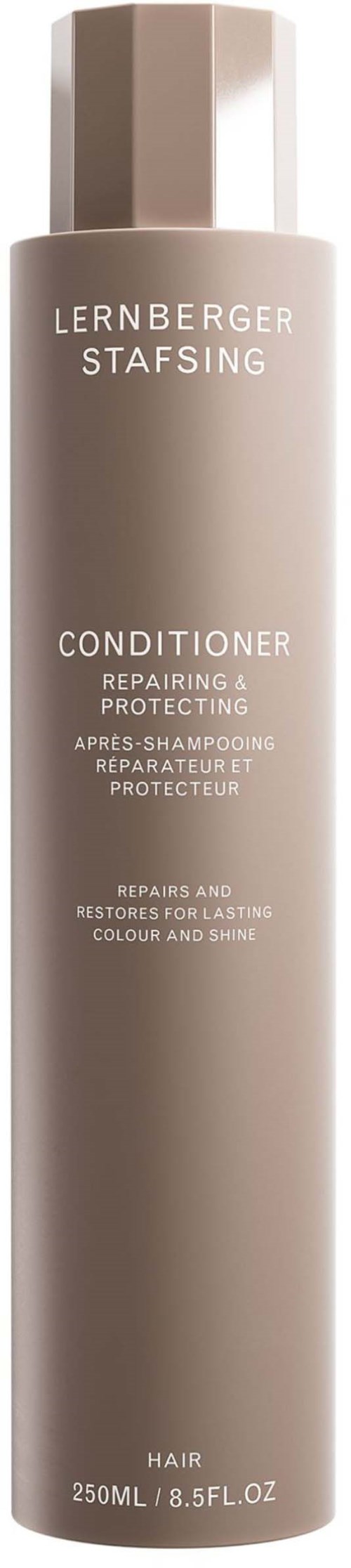 Eine lange, beige Flasche mit der Beschriftung 'Lernberger Staffsing Conditioner' für Haare, 250ml, schlichtes Design.