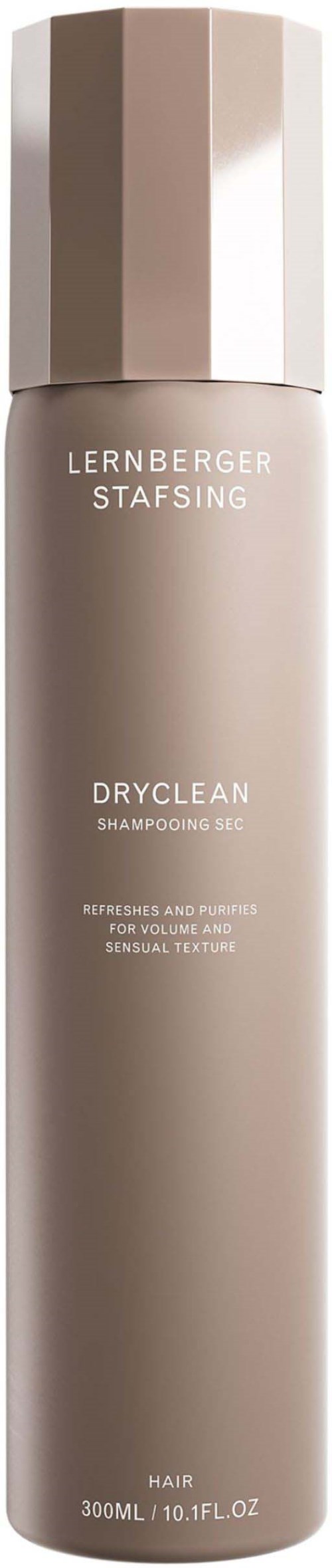 Ein hoher, beiger Flakon mit weißen Text und Deckel, beschriftet 'LERNBERGER STAFSING DRYCLEAN SHAMPOO'.