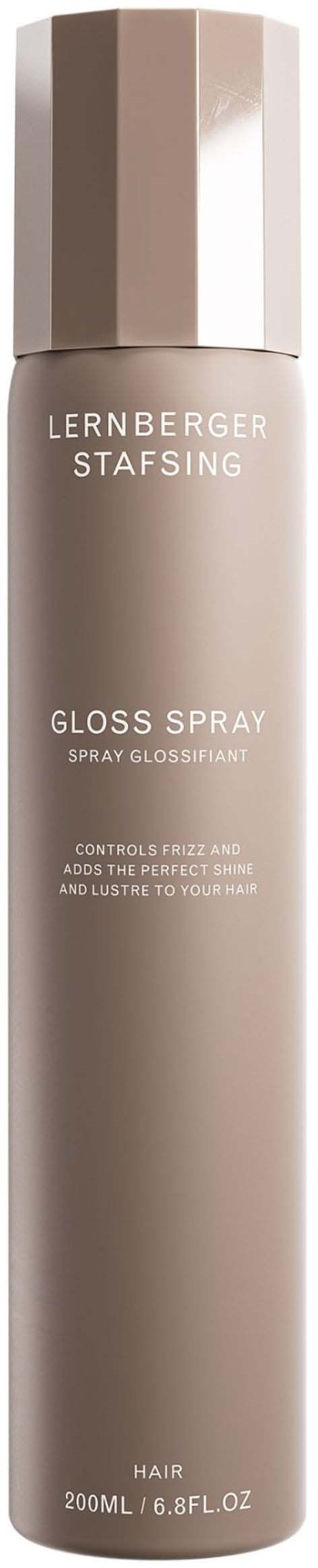 Ein langer, beiger Sprühflasche mit einem glänzenden, metallischen Deckel. Beschriftet mit 'Lernberger Stafsing Gloss Spray' für Haare.